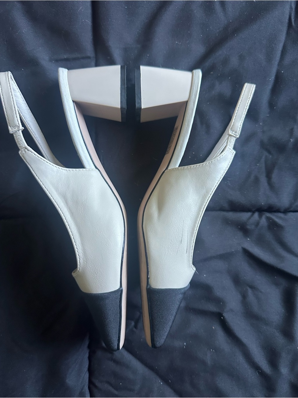 Pointed Two-Tone Slingback Mules in White and Black